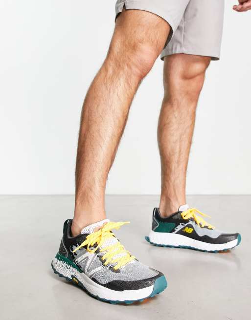 New Balance Hierro trail running trainers in grey and green ASOS