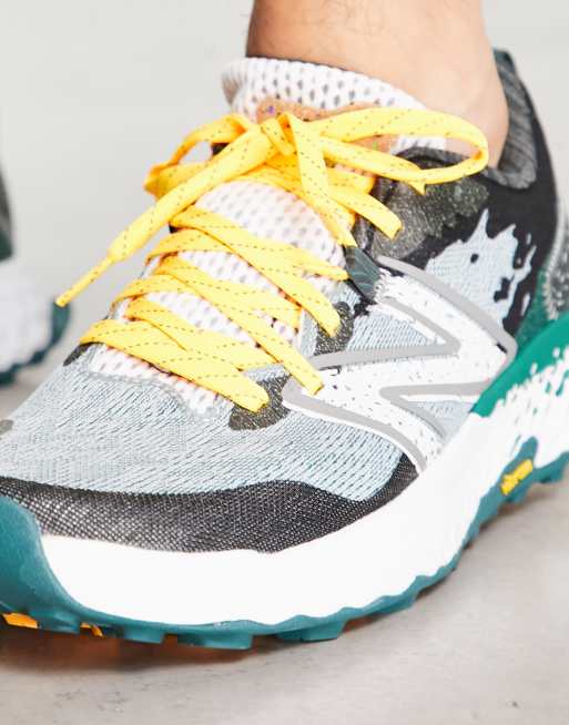 New Balance Hierro trail running trainers in grey and green