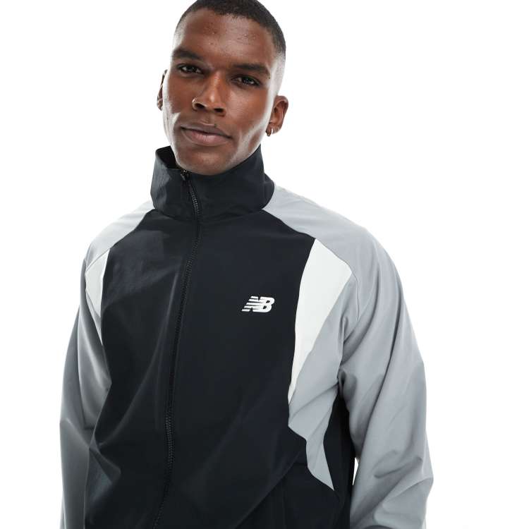 New Balance In game woven track jacket in black | ASOS