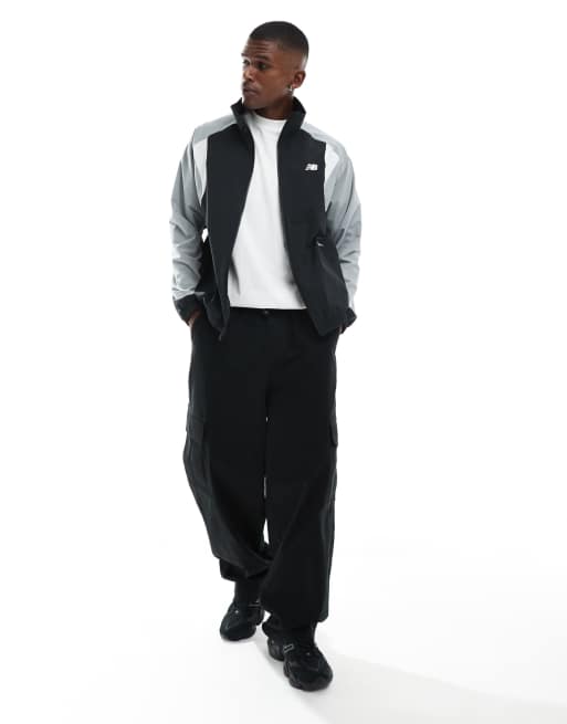 New Balance In game woven track jacket in black | ASOS