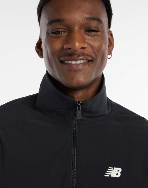 New Balance In game woven track jacket in black | ASOS
