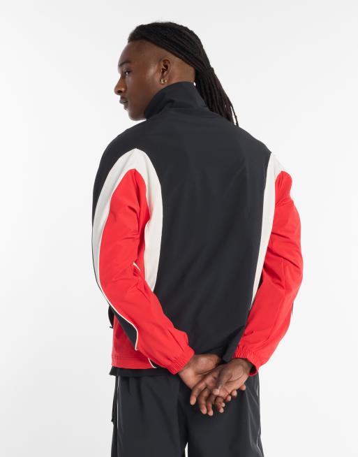 New Balance In game woven track jacket in black | ASOS