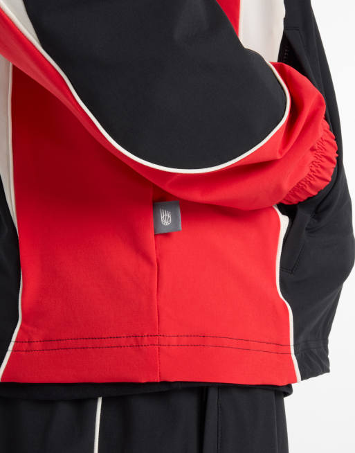 New Balance In game woven track jacket in black | ASOS