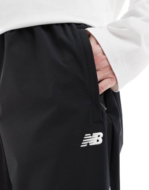 New Balance In game woven track pant in black