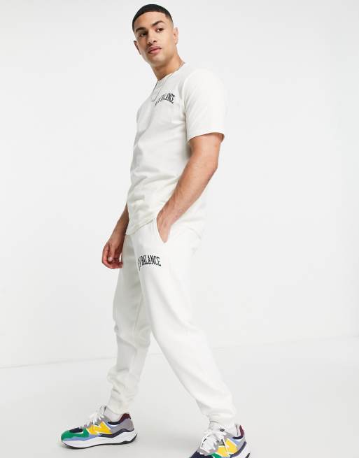 New Balance - Jogger style universitaire - Blanc cassé et vert