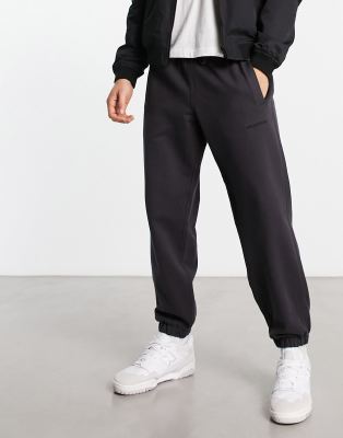 New Balance washed trackies with logo in washed grey - ASOS Price Checker