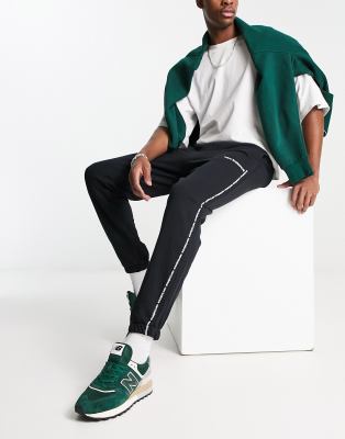 New Balance Joggers Neri Con Logo Lineare Asos