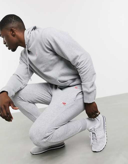 New Balance - Joggingbroek met klein logo in grijs