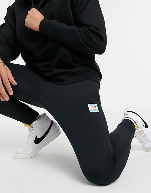 New Balance label logo jogger in washed black New Balance label logo jogger in washed black