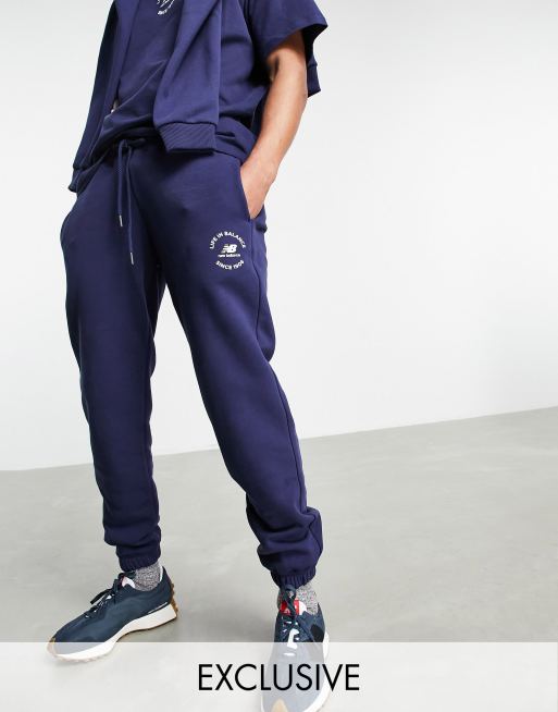 New Balance life in balance trackies in navy Exclusive to ASOS