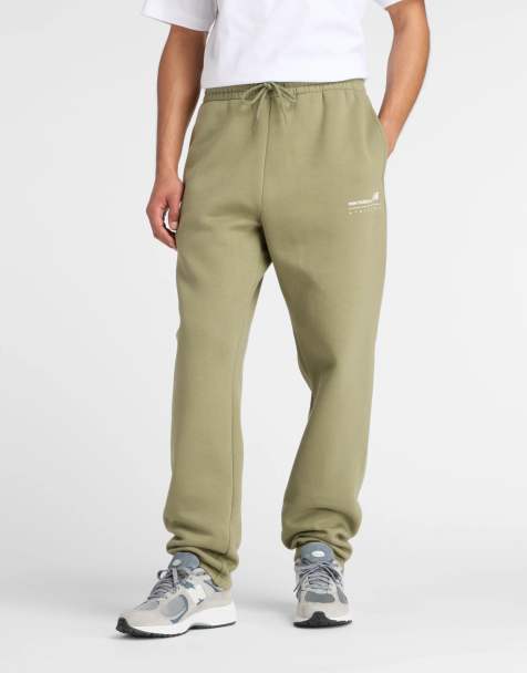 New Balance Linear graphic fleece pant in green