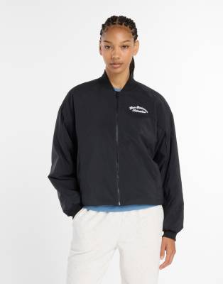 New Balance - Linear - Heritage - Gewebte Bomberjacke in Schwarz