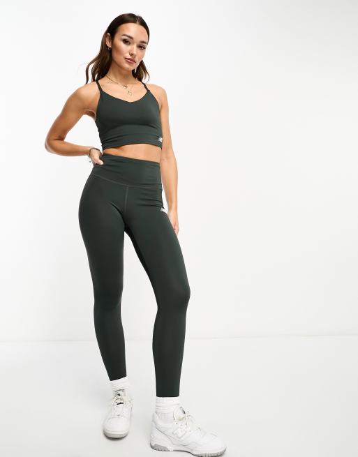 New Balance Linear Heritage light impact sports bra in washed black, 4 of 4