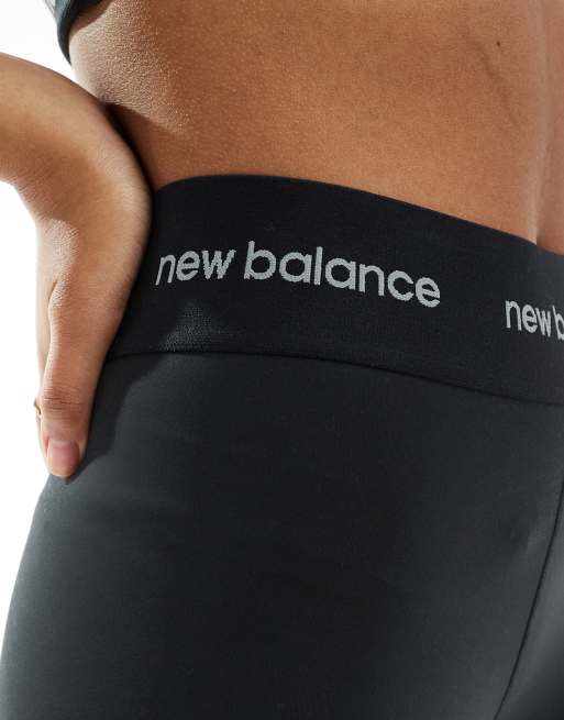 New Balance Linear Logo sleek 25 inch high rise leggings in black