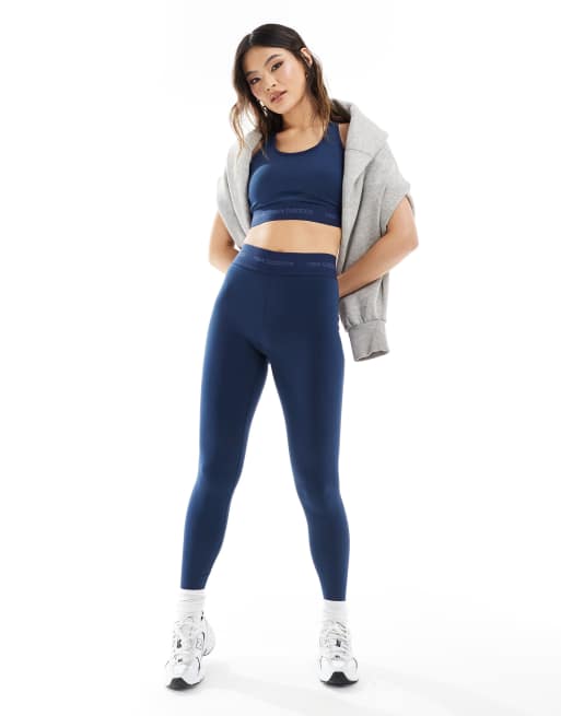 New Balance Linear Logo sleek 25 inch high rise leggings in navy ASOS