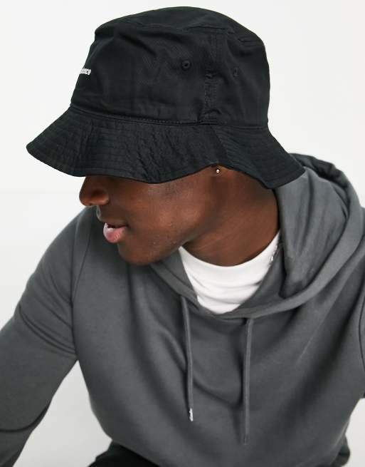 New Balance logo bucket hat in black | ASOS