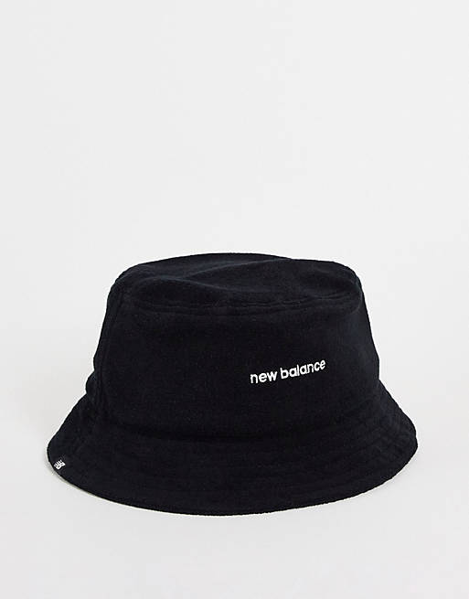 New Balance logo terry bucket hat in black | ASOS