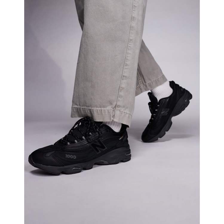 New Balance M1000 cordura unisex trainers in black and silver | ASOS