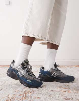  M1000 trainers in teal and grey