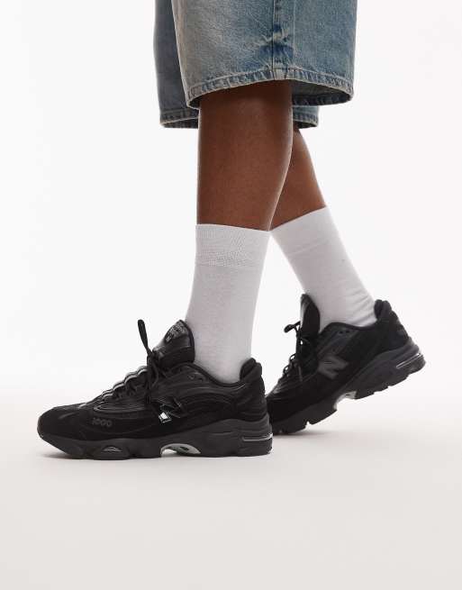 New Balance M1000 trainers in triple black