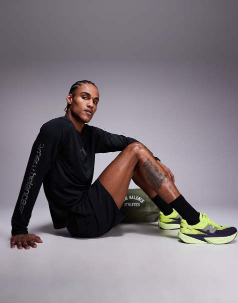 New Balance - Maglietta a maniche lunghe da corsa in poliestere nera con dettagli catarifrangenti - view 1