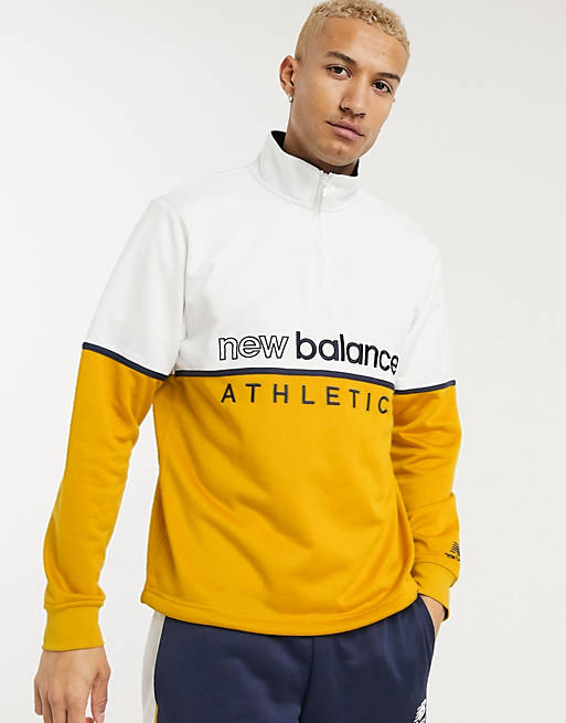 New Balance - Maglione giallo con zip corta