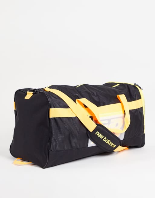 New Balance medium duffel bag in black and yellow ASOS