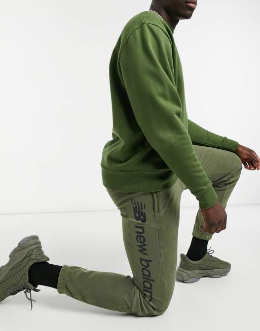 New Balance micro fleece joggers in green