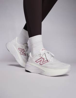 New Balance More running trainers in off white and rose pink