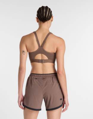 New Balance Nb essential run bra in brown