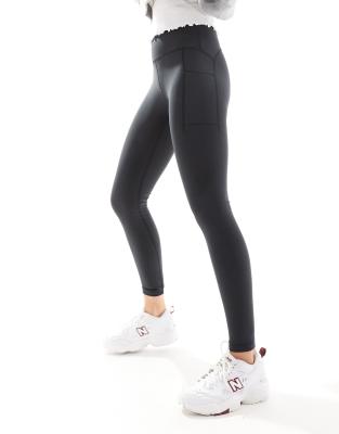 New Balance - Nb - Leggings in Schwarz mit hohem Bund und flacher Hosentasche, 27 Zoll Schrittlänge