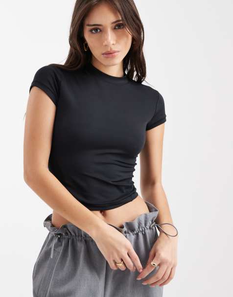 New Balance - NB - Nauwsluitend T-shirt in zwart - view 1