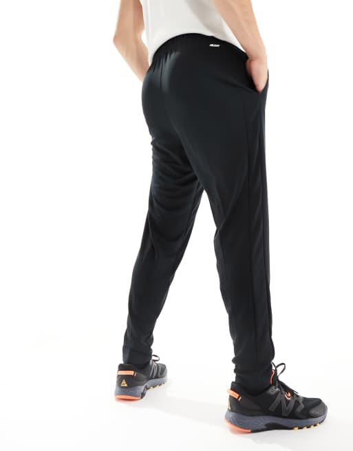 New Balance Nb tech training knit track pant in black | ASOS