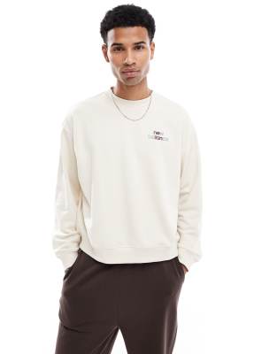 New Balance - Oversize-Sweatshirt aus French Terry in Beige mit Rundhalsausschnitt und Logo-Braun