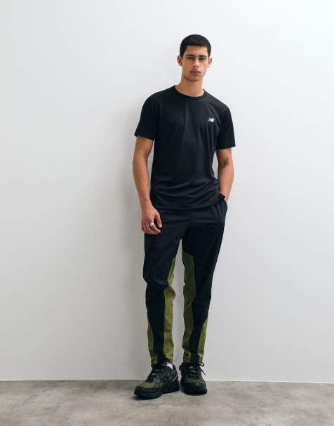 New Balance pantalon tissé stretch Utility noir et vert sport - view 1