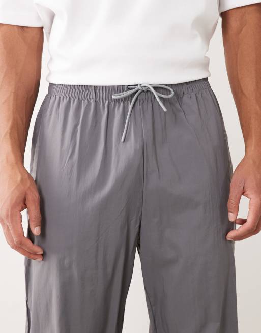New Balance - Pantalones grises Sport Legacy, 4 de 5