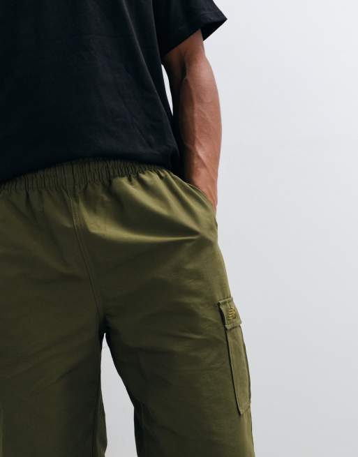 New Balance - Pantaloni cargo color alga wakame, 3 di 5