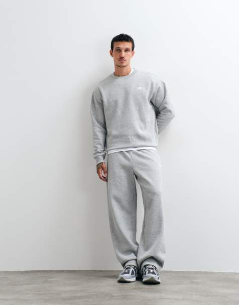New Balance pantaloni sportivi in pile grigi - view 1