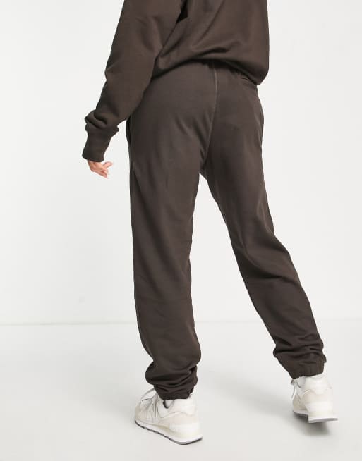 New Balance - Pantaloni sportivi unisex marroni con logo, 4 di 4