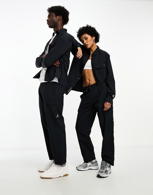 New Balance Part of the Family Overhemd in zwart exclusief bij ASOS
