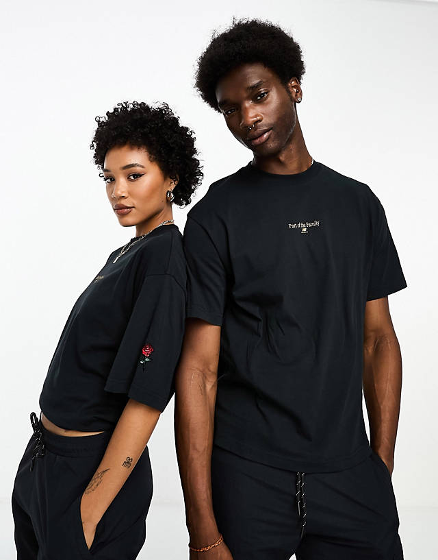New Balance - part of the family oversized short sleeve top in black - exclusive to asos
