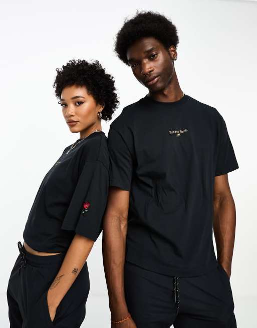 New Balance Part of the Family oversized short sleeve top in black ...