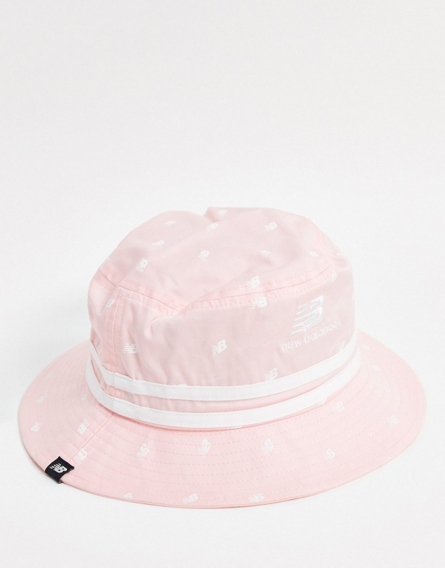 New Balance printed logo bucket hat in peach soda-Pink