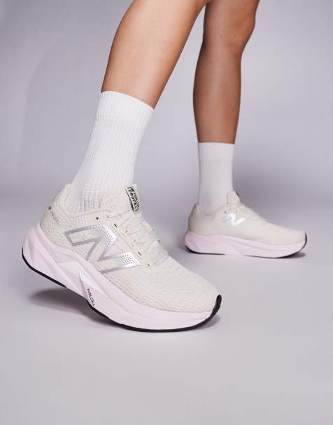 New Balance Propel running trainers in beige and pink - view 1