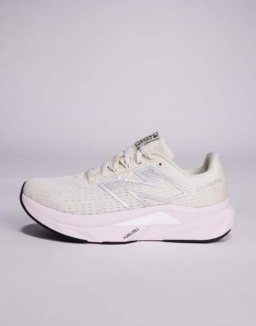 New Balance Propel running trainers in beige and pink, 2 of 5