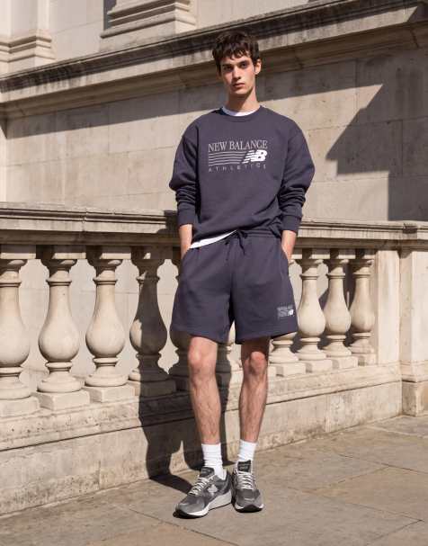 New Balance przeprojektowane czarne szorty z polaru z grafiką 7 cali - view 1