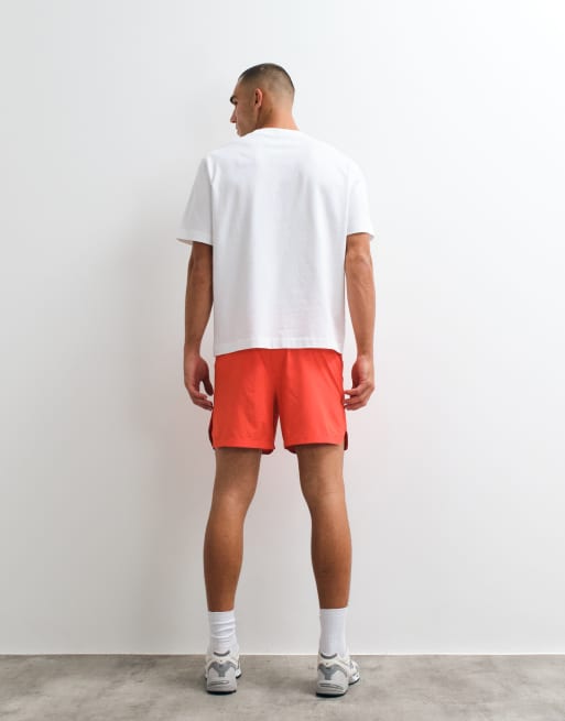 New Balance - Rc Essential - Pantaloncini da 5" color fiamma fluo, 2 di 5