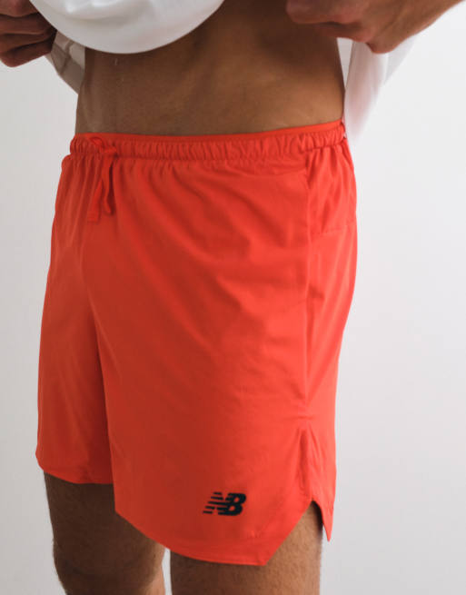 New Balance - RC - Pantalones cortos básicos con estampado naranja flamante, 4 de 5