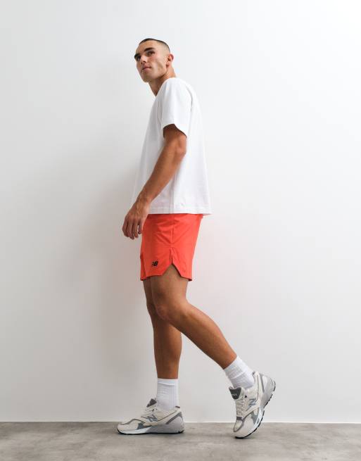New Balance - RC - Pantalones cortos básicos con estampado naranja flamante, 5 de 5