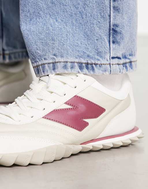 New Balance 574 trainers in white and burgundy